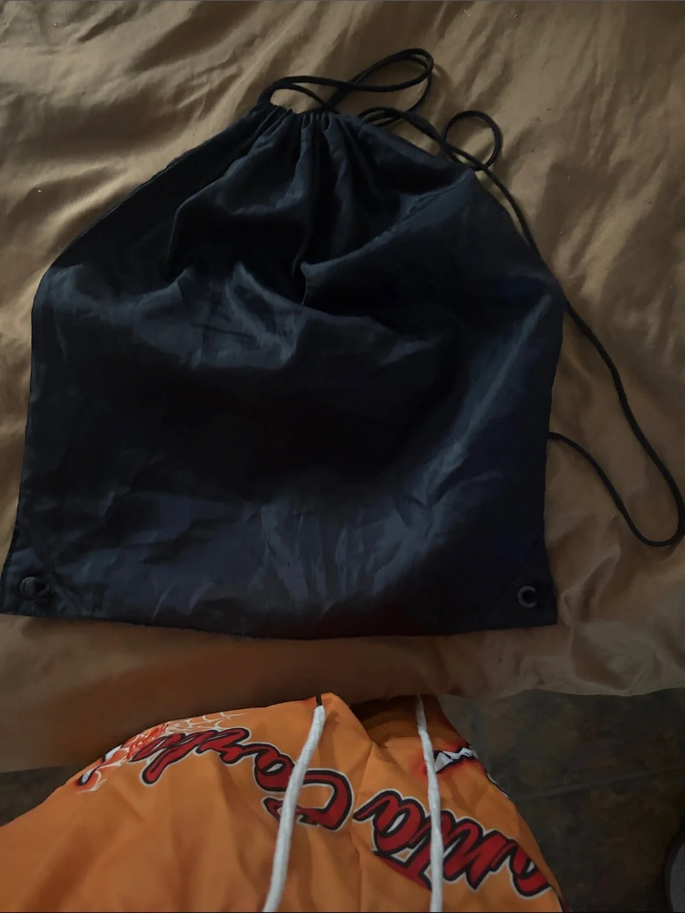 Universal Black Drawstring Backpack with Multicolor Logo